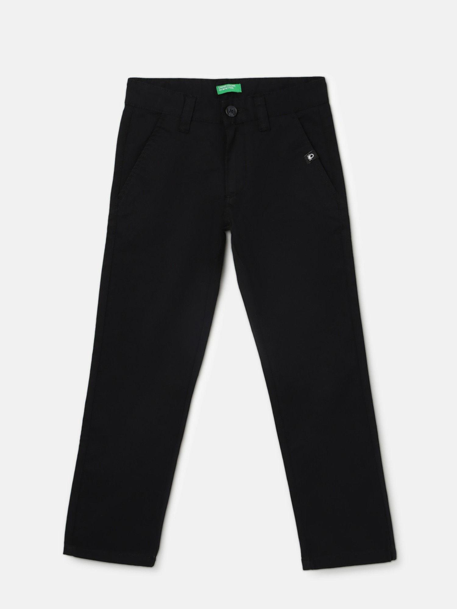 black boys solid slim fit trousers with button closure