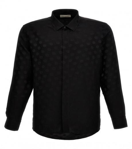 black polka dot shirt