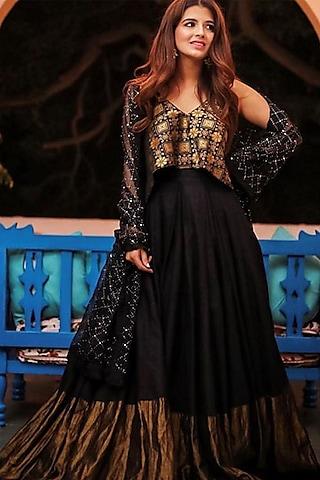 black & gold lehenga with asymmetric top