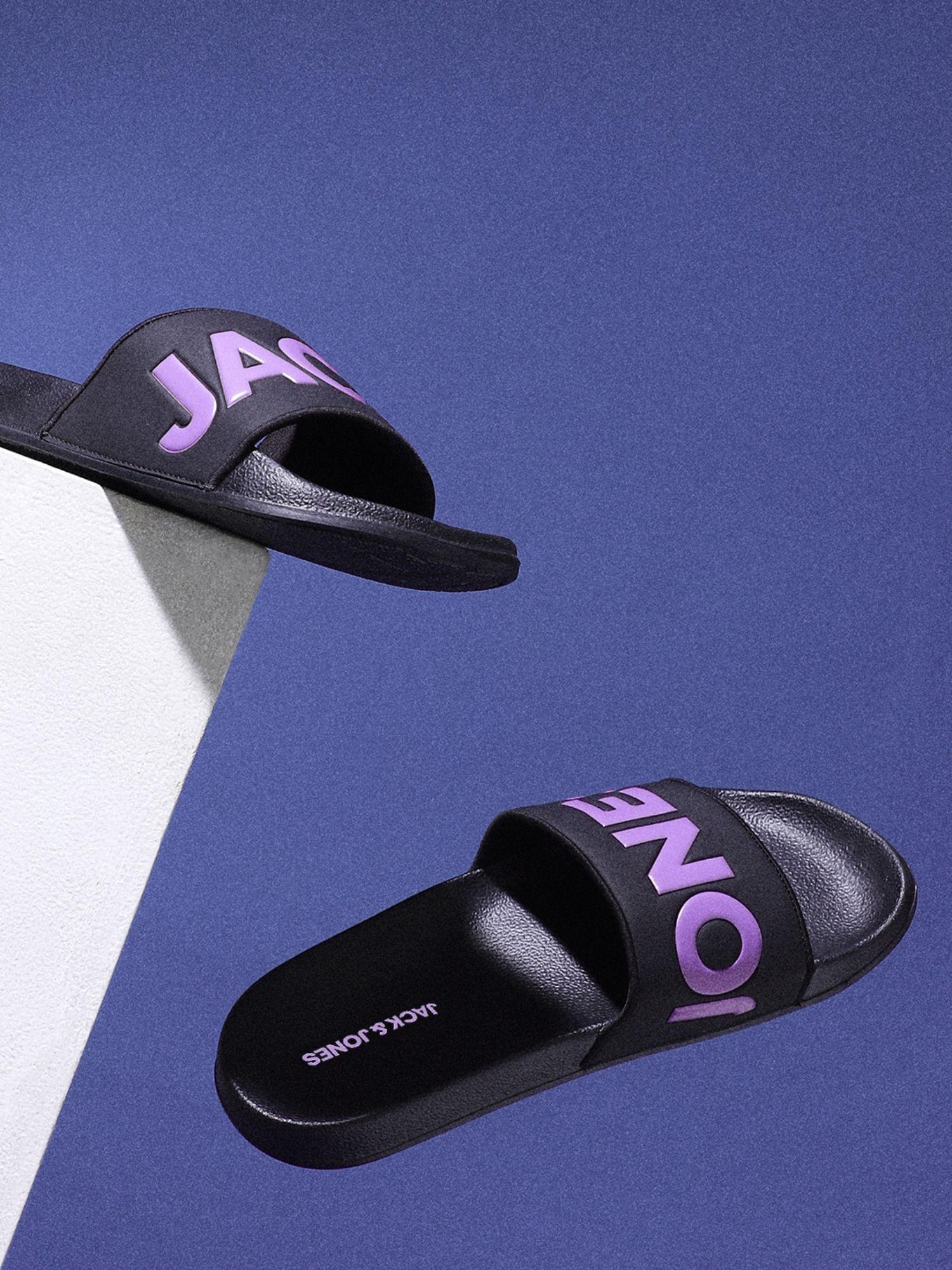 black & purple logo print sliders