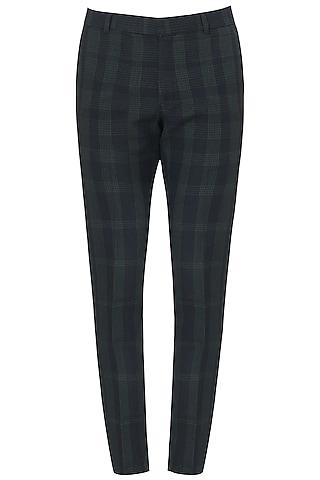 black and green checked trousers