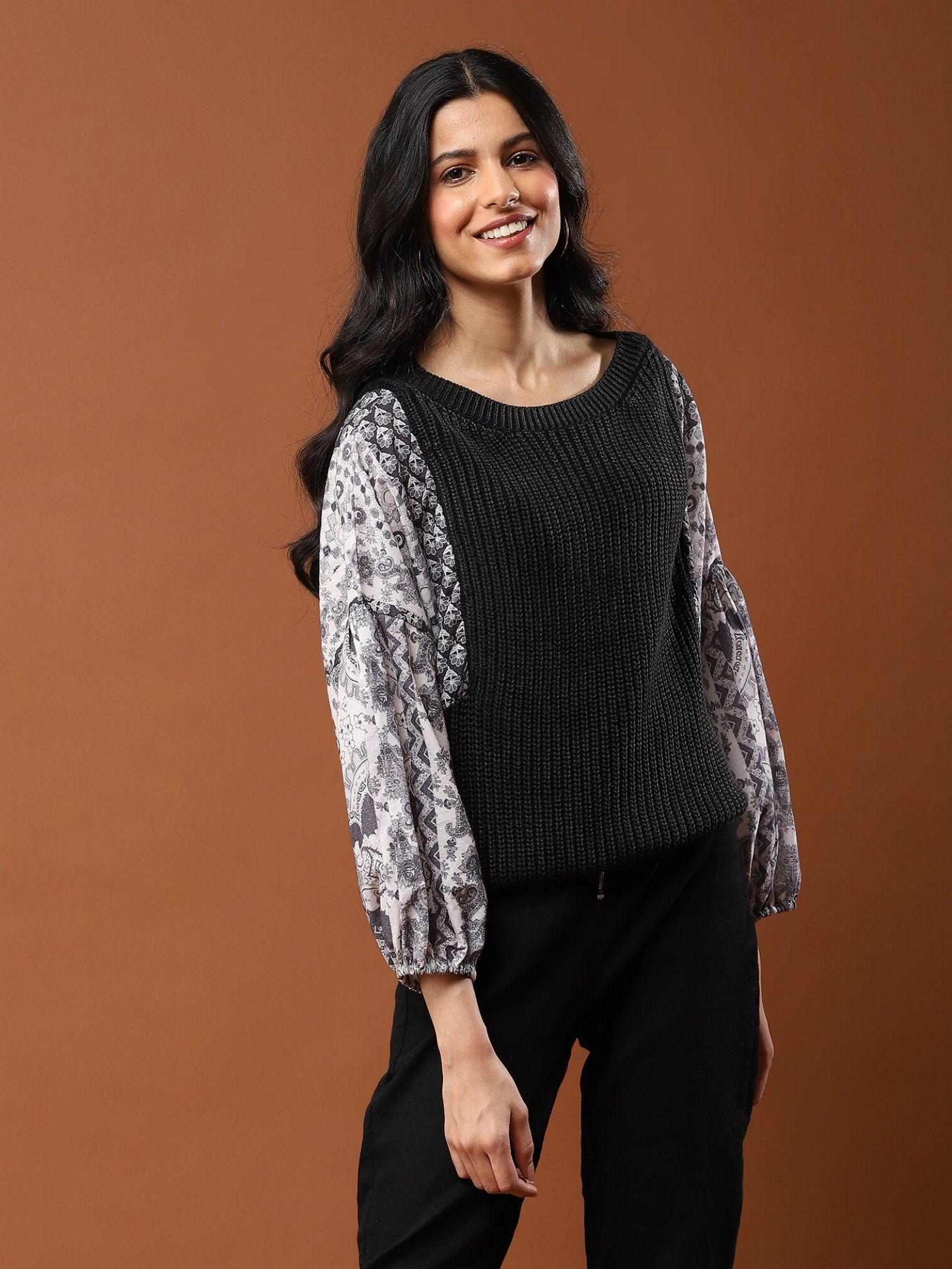 black cable knit sweater