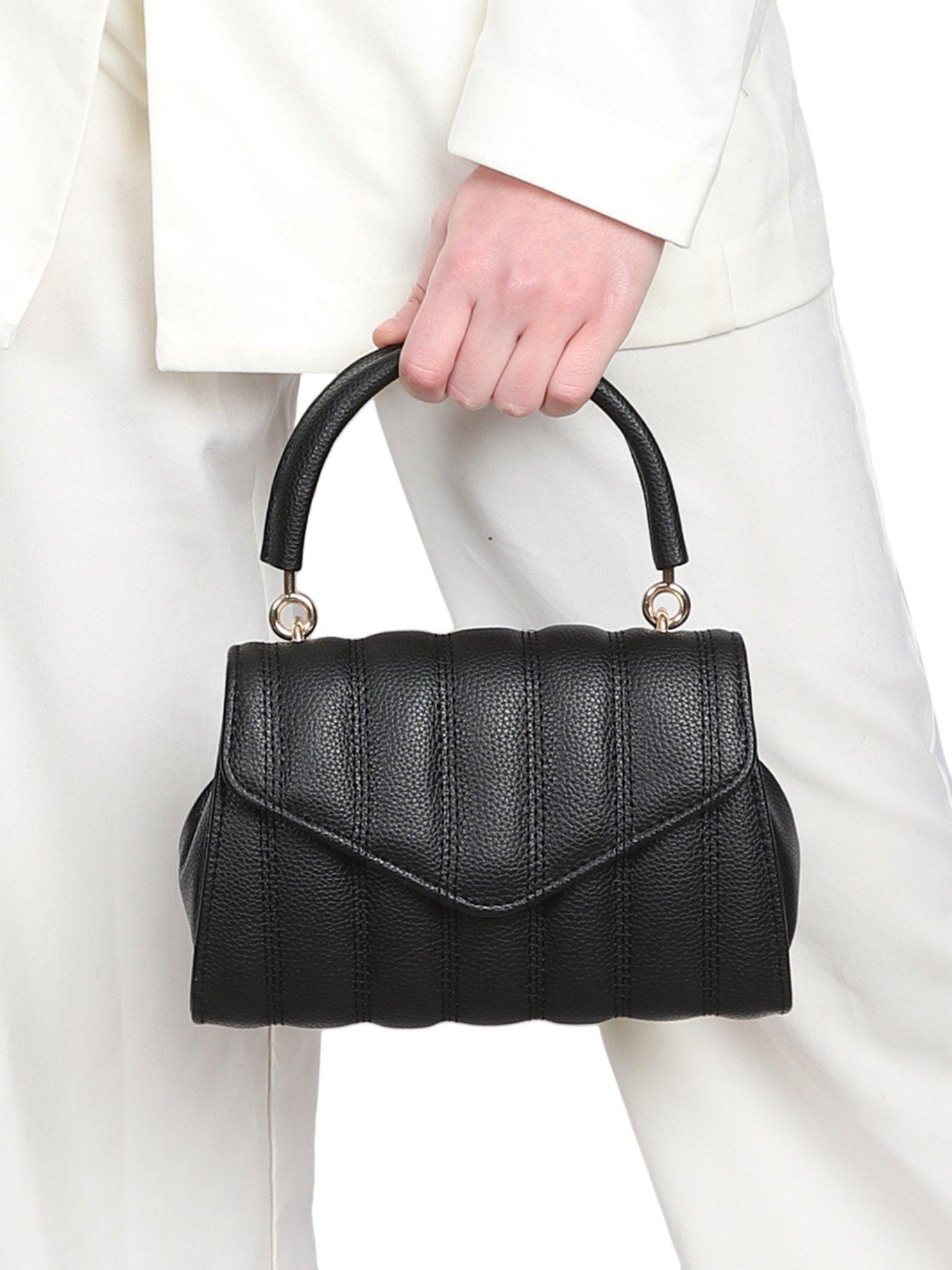 black casual synthetic leather solid handheld bag