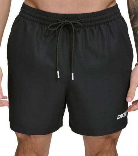 black core solid swim trunks