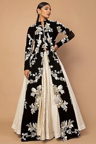 black embroidered jacket with kalidar skirt