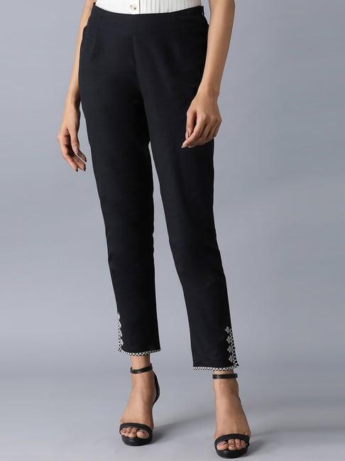 black embroidered pants