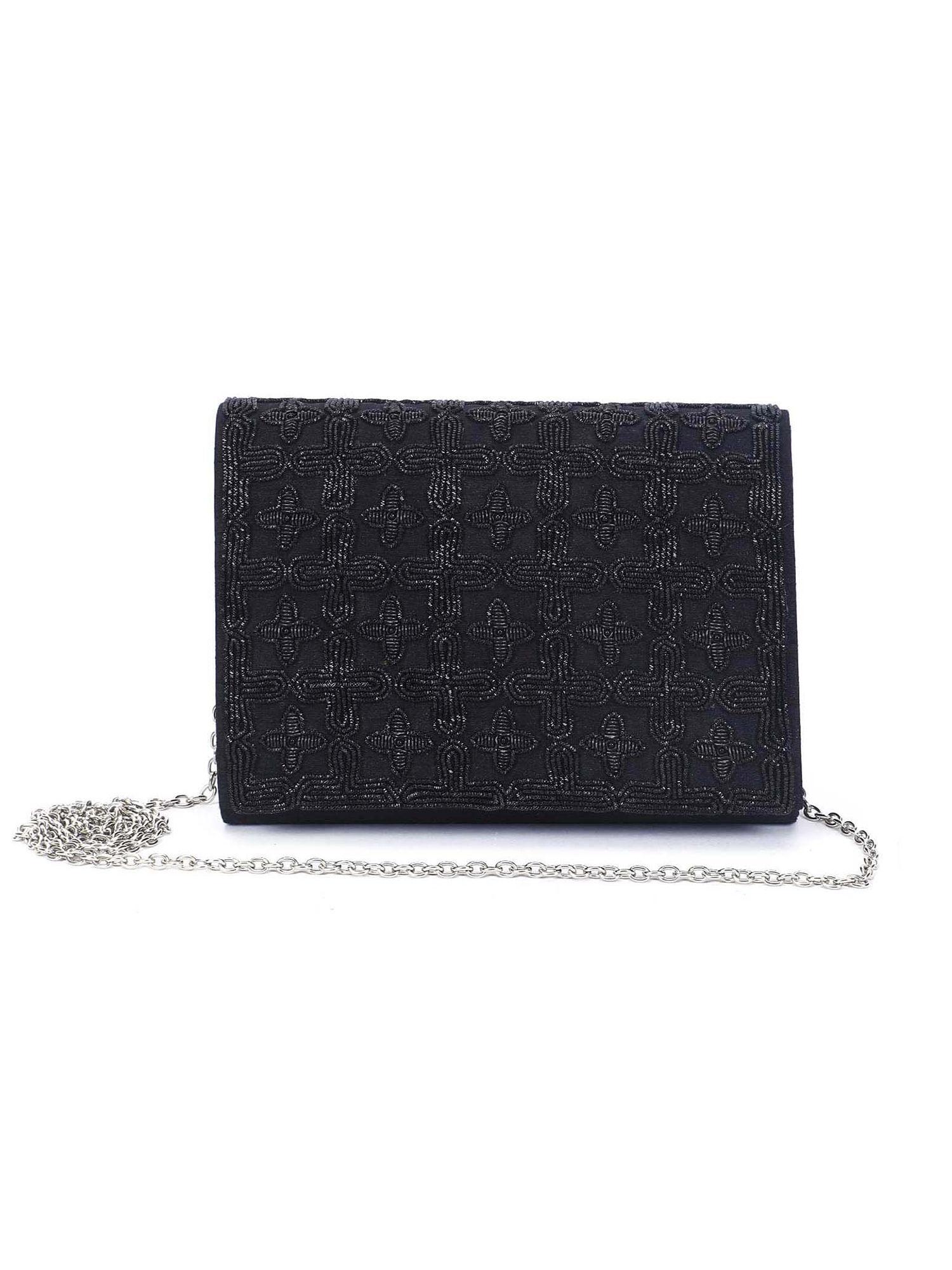 black embroidered sling bag