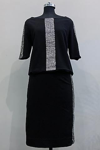 black embroidered top with skirt