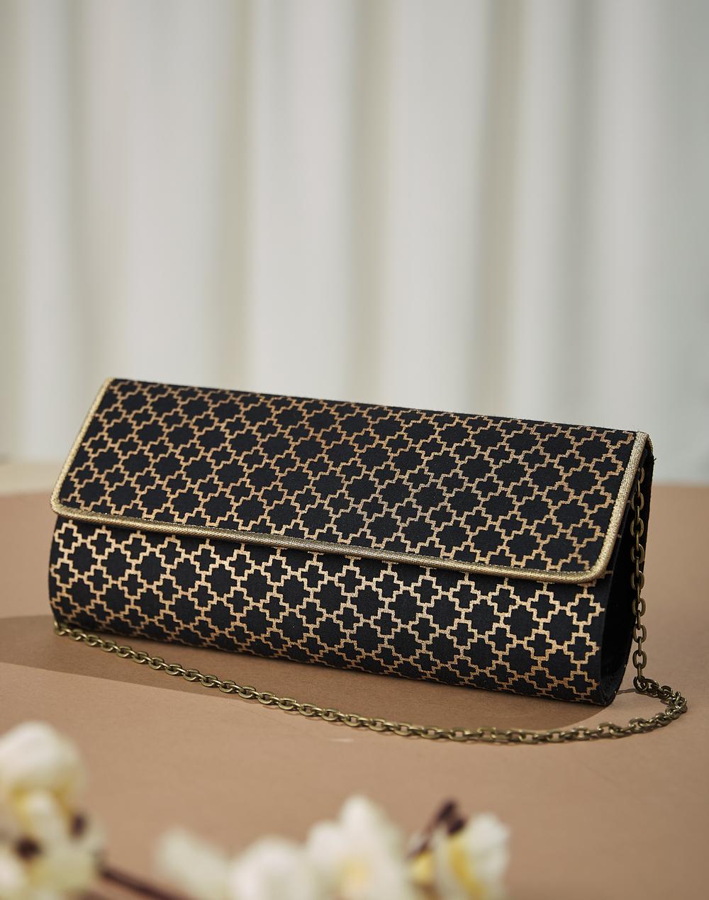 black fabric geometric printed clutch