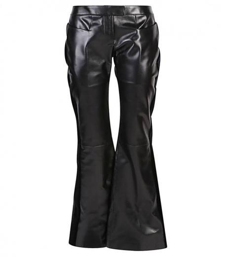 black flared leather and velvet trousers