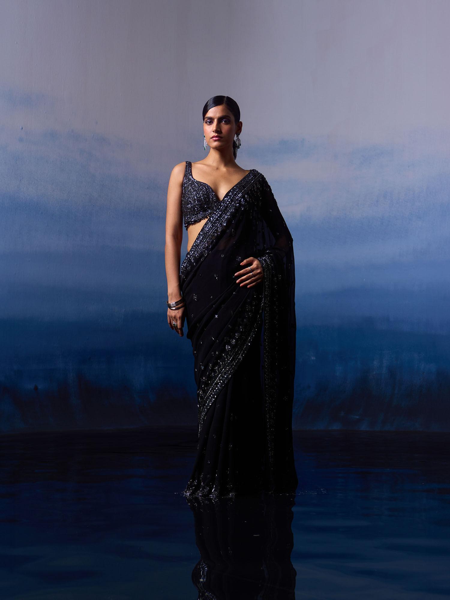 black gear saree with stitched blouse and petticoat