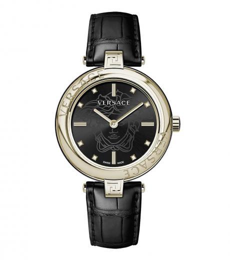 black golden round dial watch