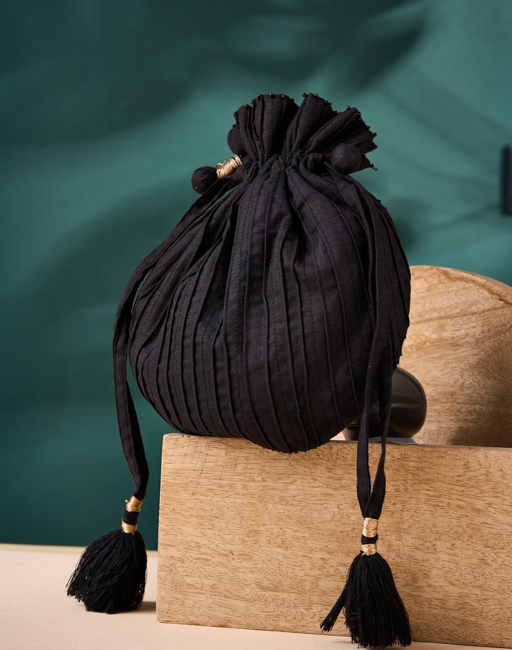 black hand embroidered potli bag