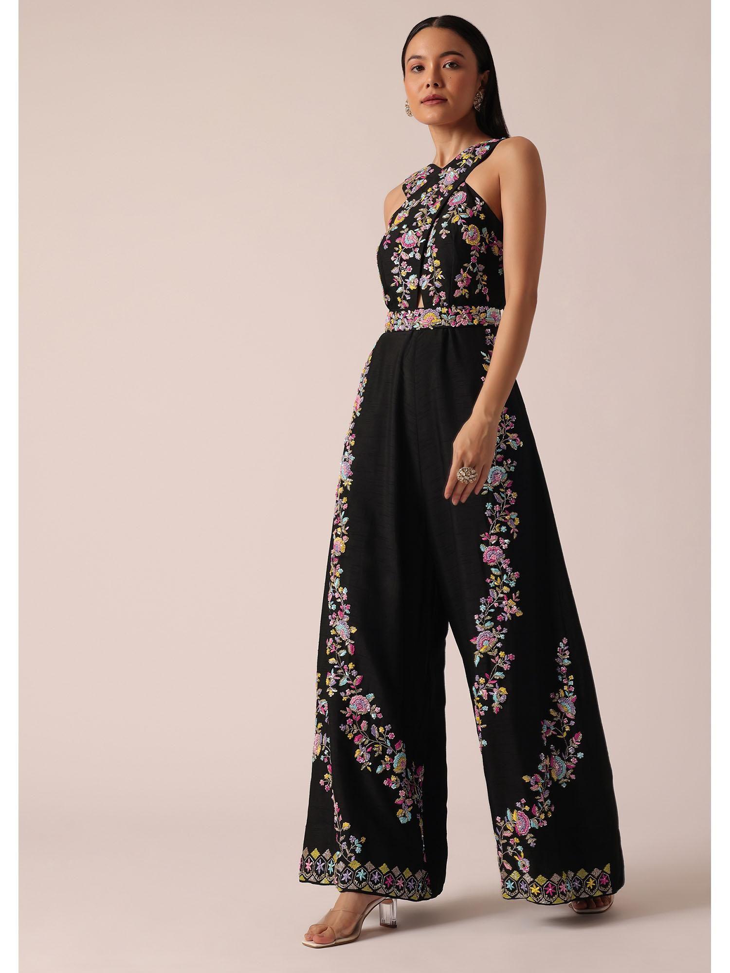 black jumpsuit with floral motif embroidery