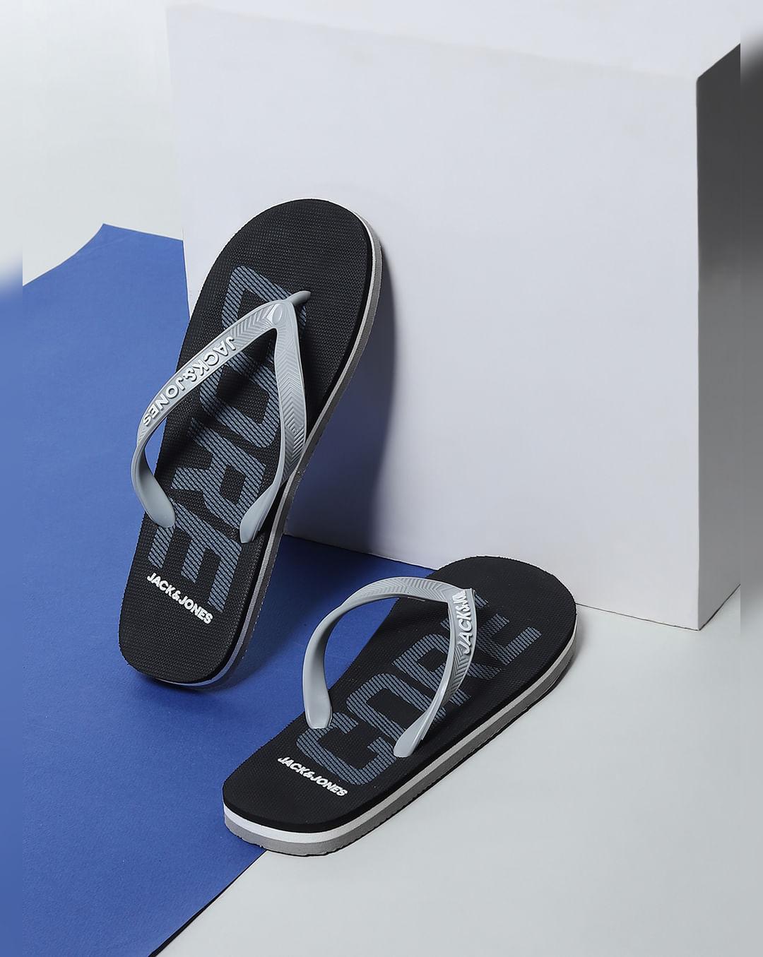 black logo print flip flops