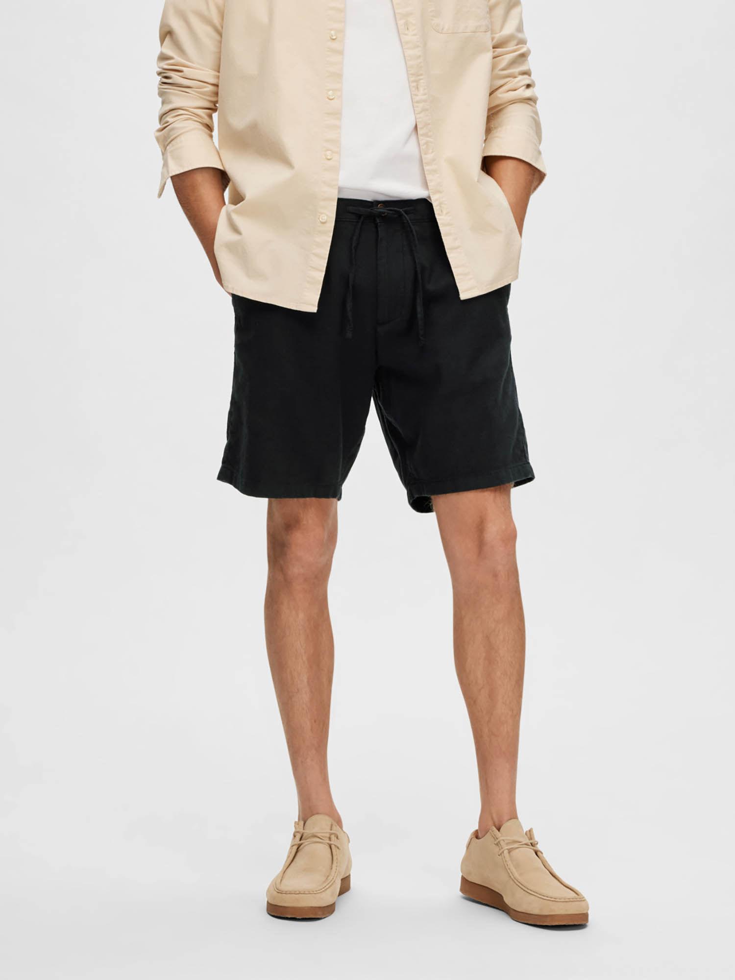 black mid rise linen shorts