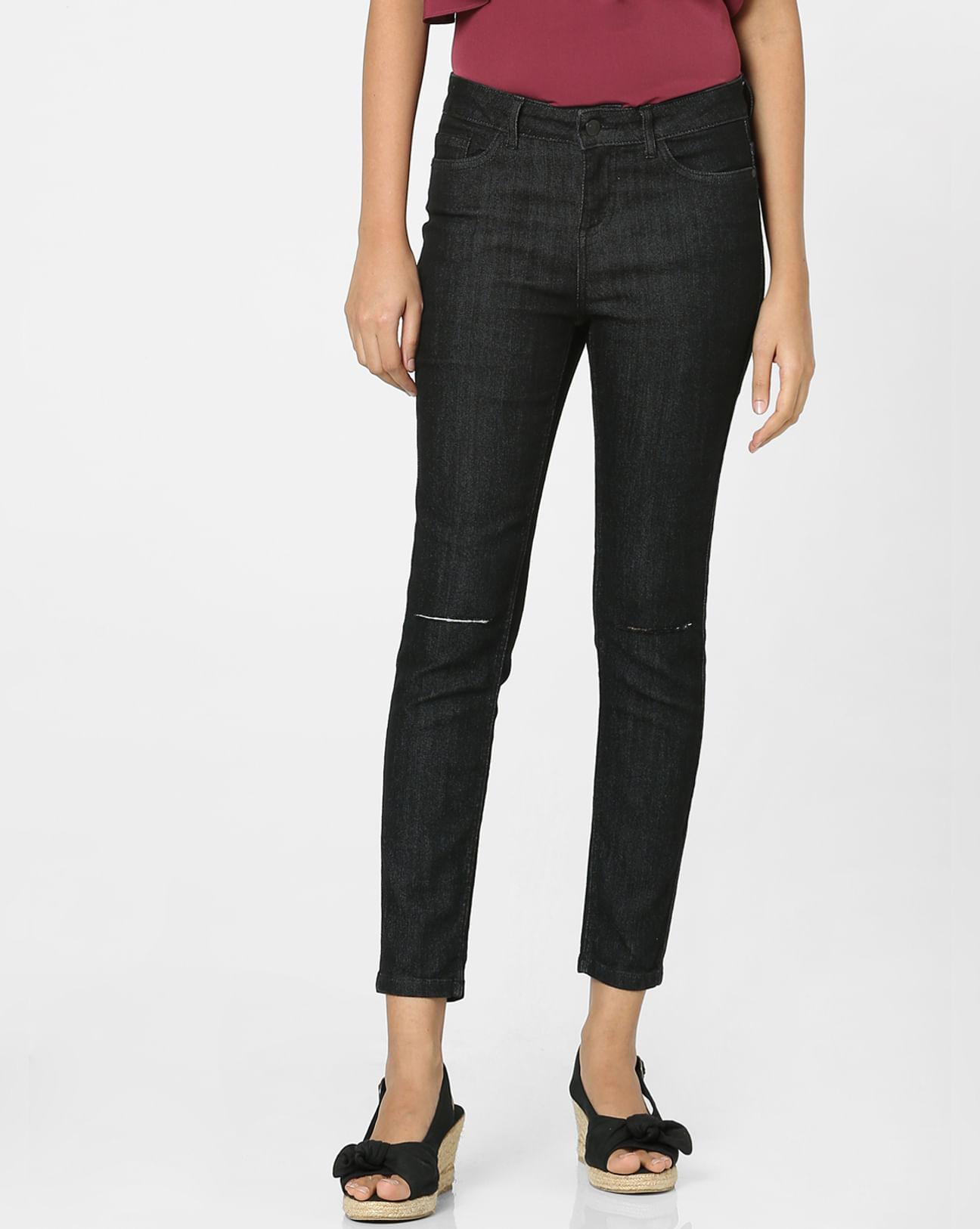 black mid rise skinny jeans