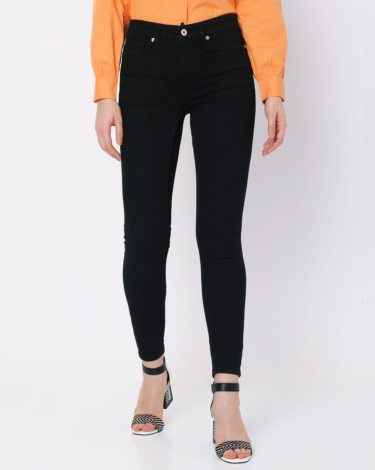 black mid rise skinny jeans