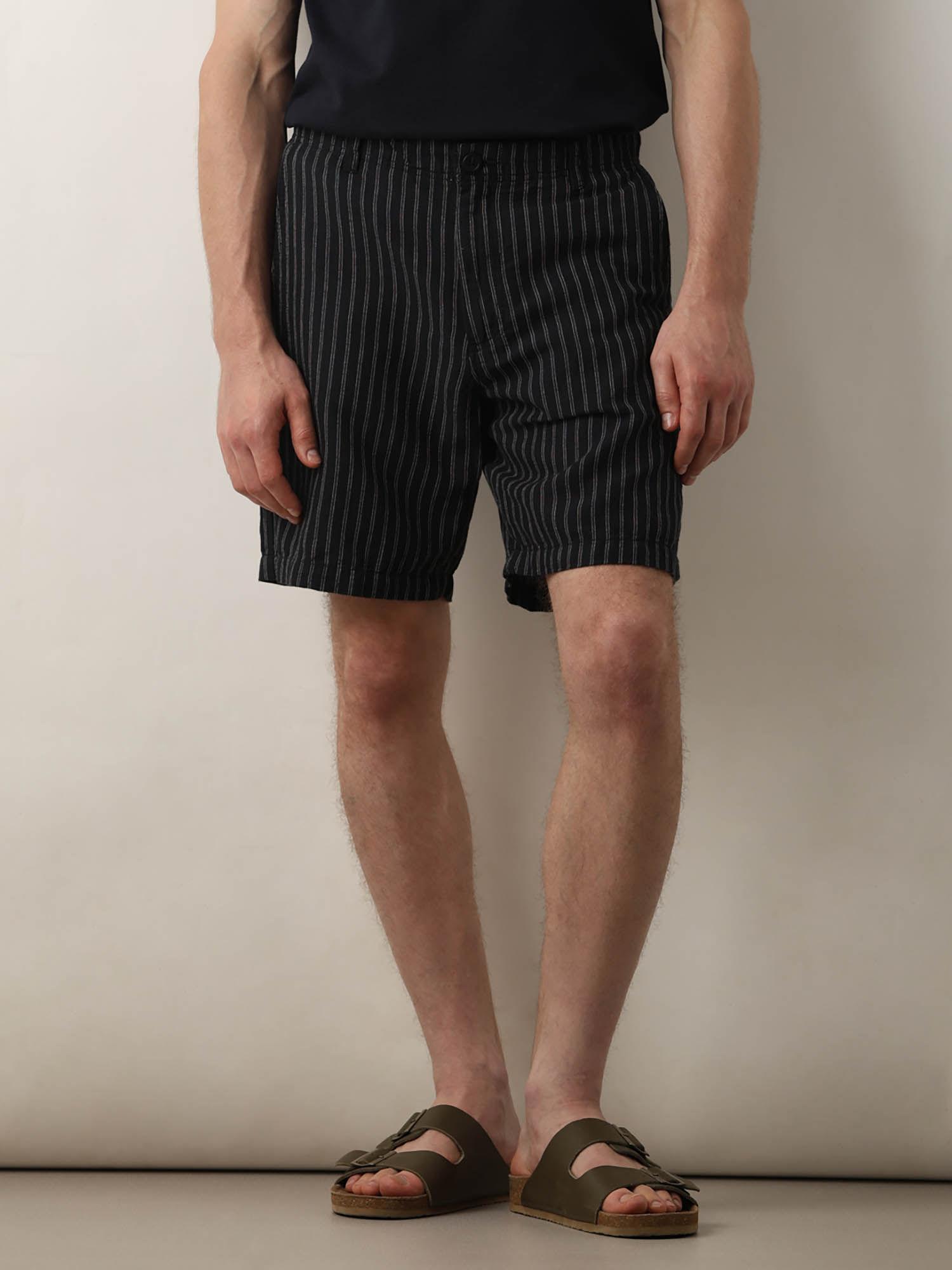 black mid rise striped shorts