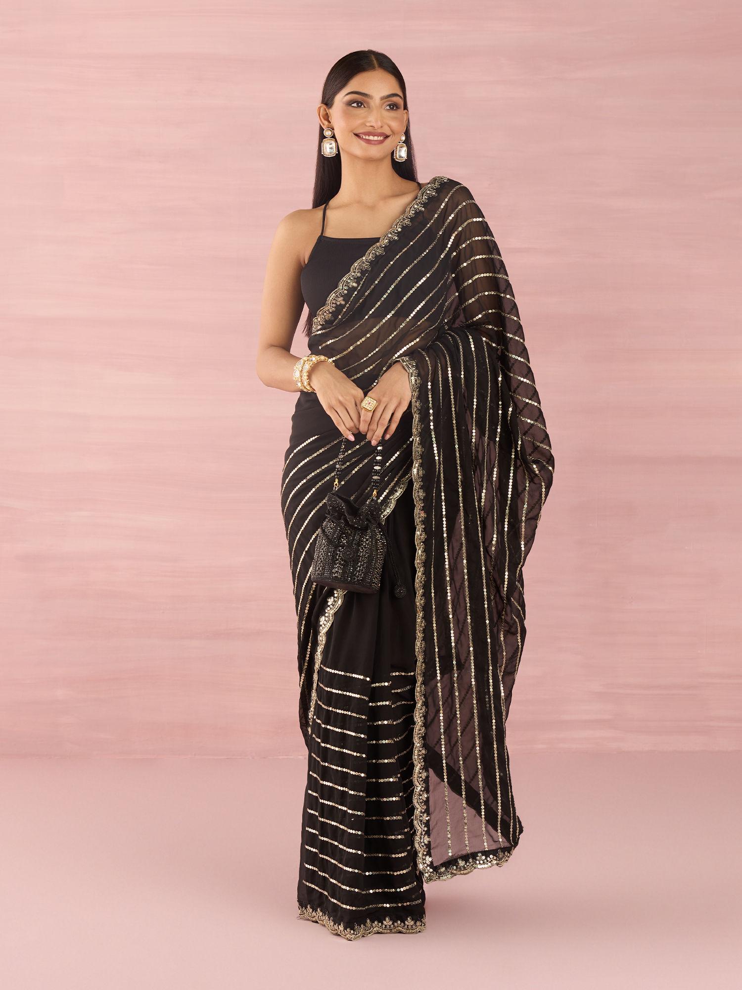 black organza stripes embroidered sequined party saree and unstitched blouse