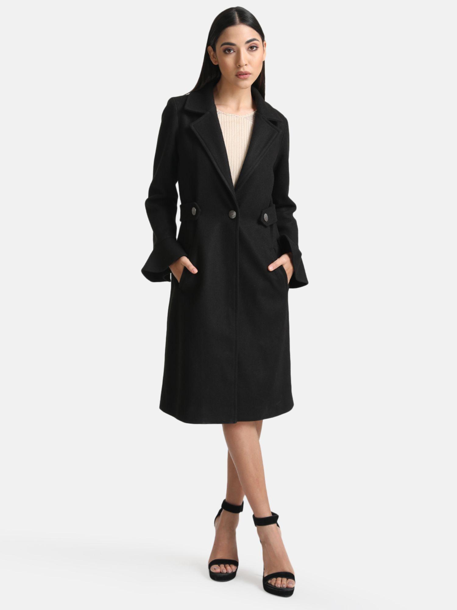 black overcoat with peplum sleeves