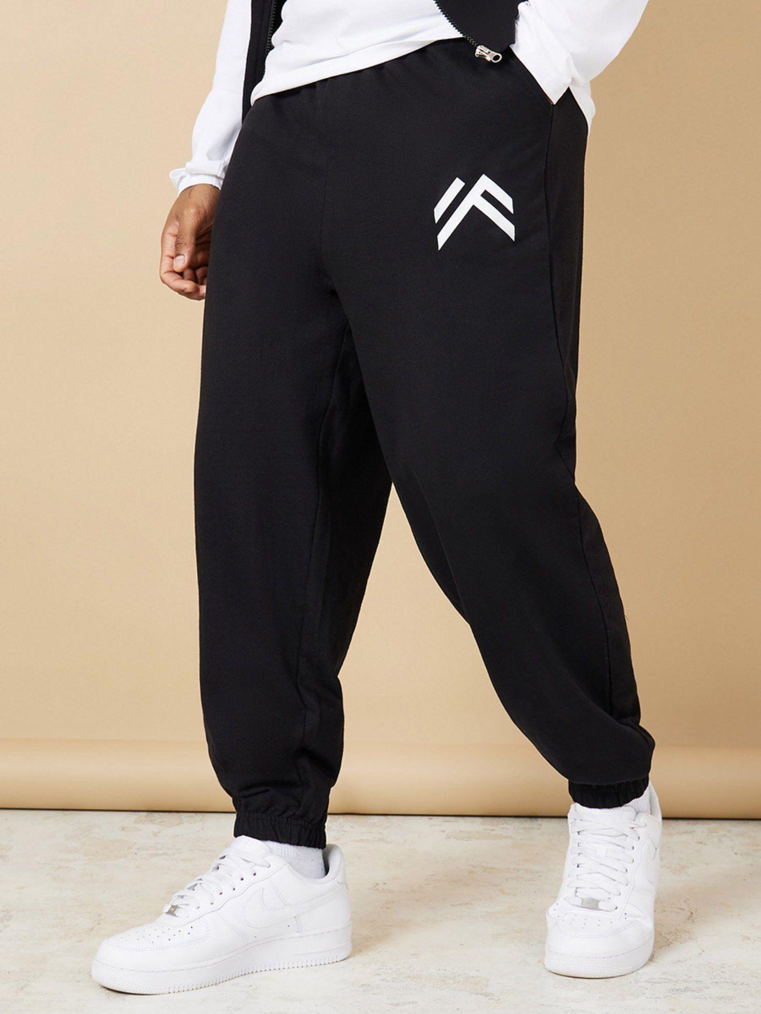 black oversize fit jogger with minimal print detail - elasticated hem