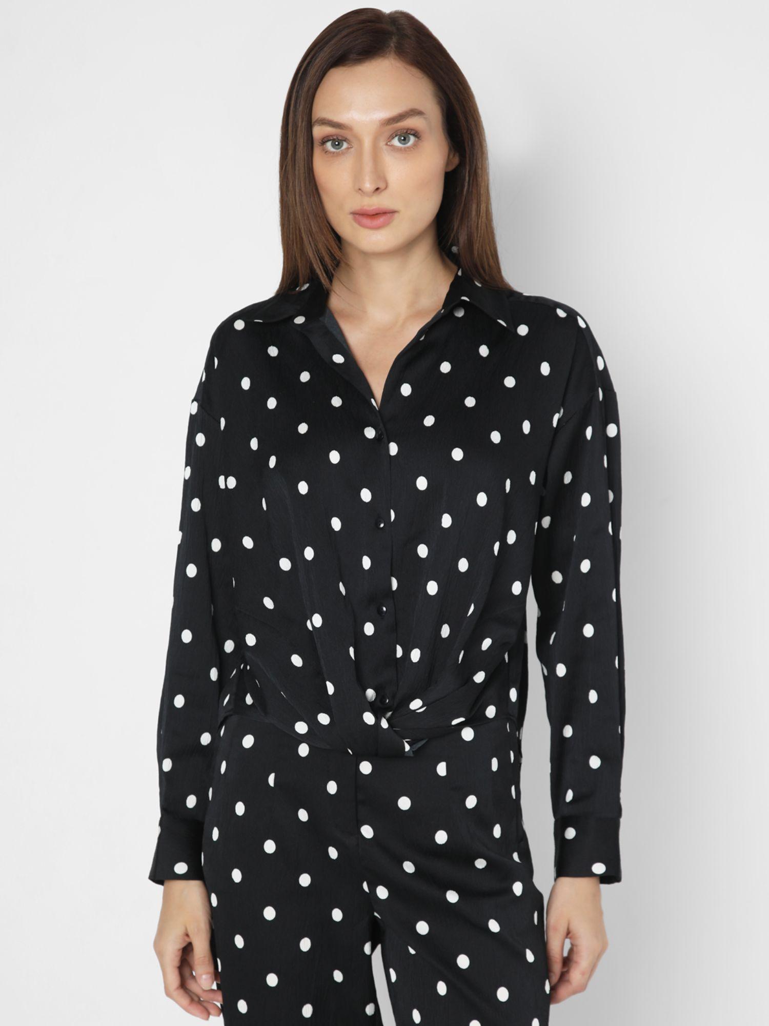 black polka dot shirt