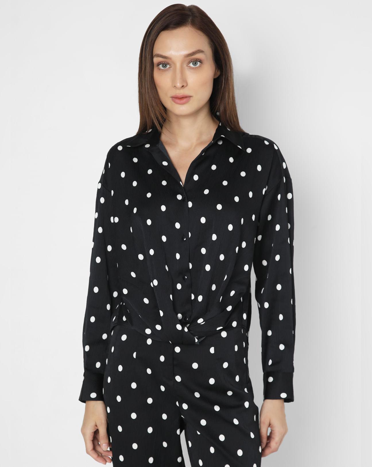 black polka dot shirt