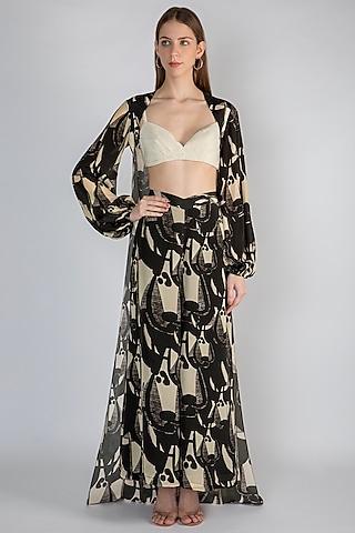 black printed cape with palazzo pants & ivory embellished bustier