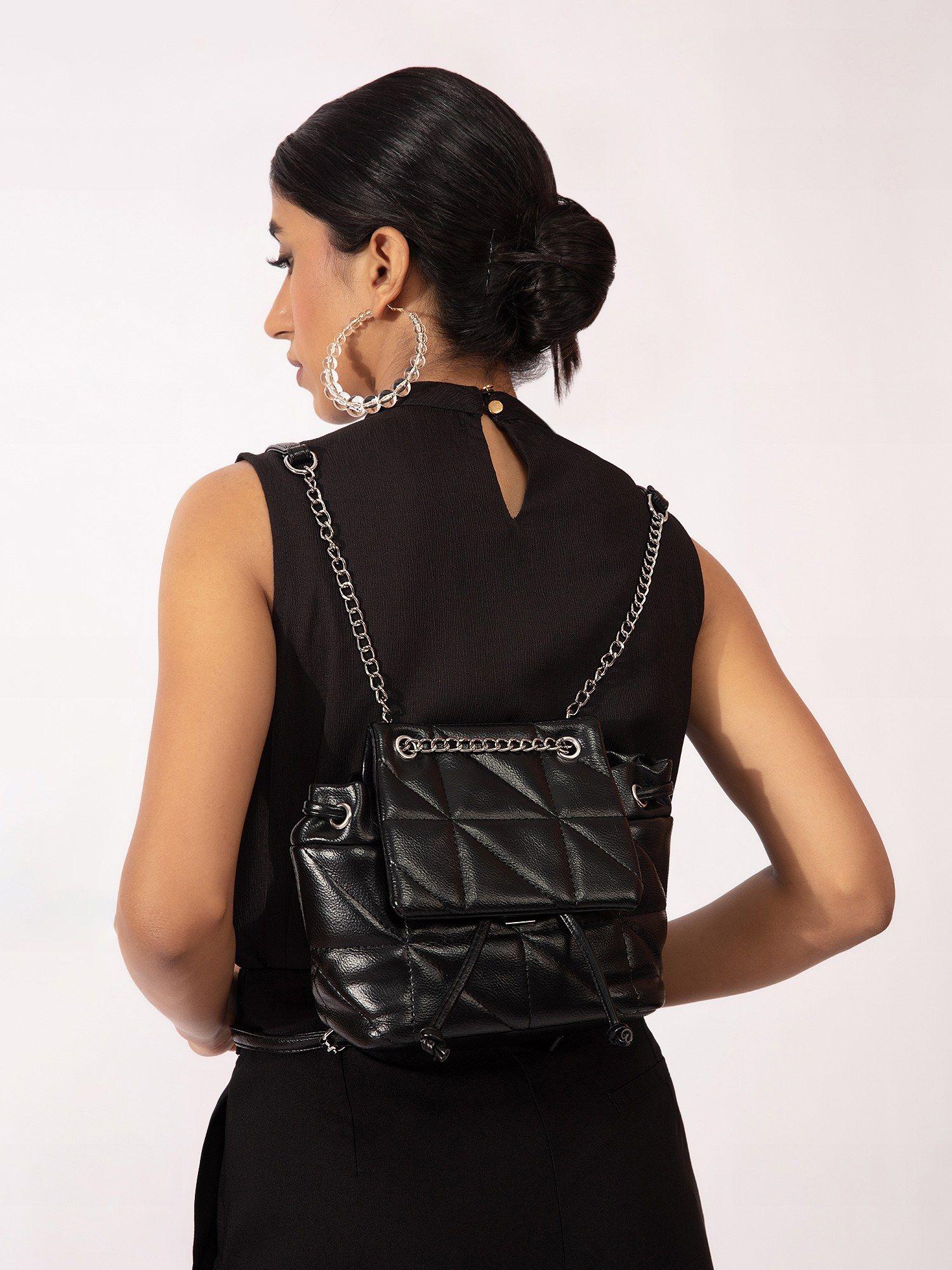 black quilted chain strap small backpack