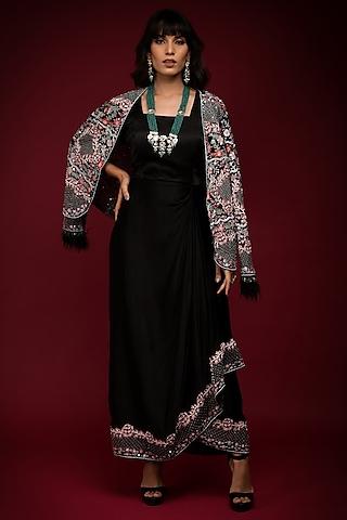 black satin draped gown with embroidered jacket
