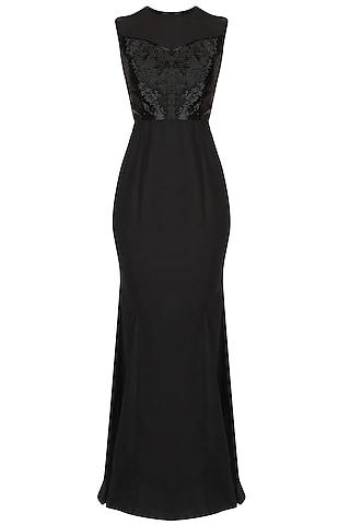 black sleeveless evening gown with floor sweeping folds