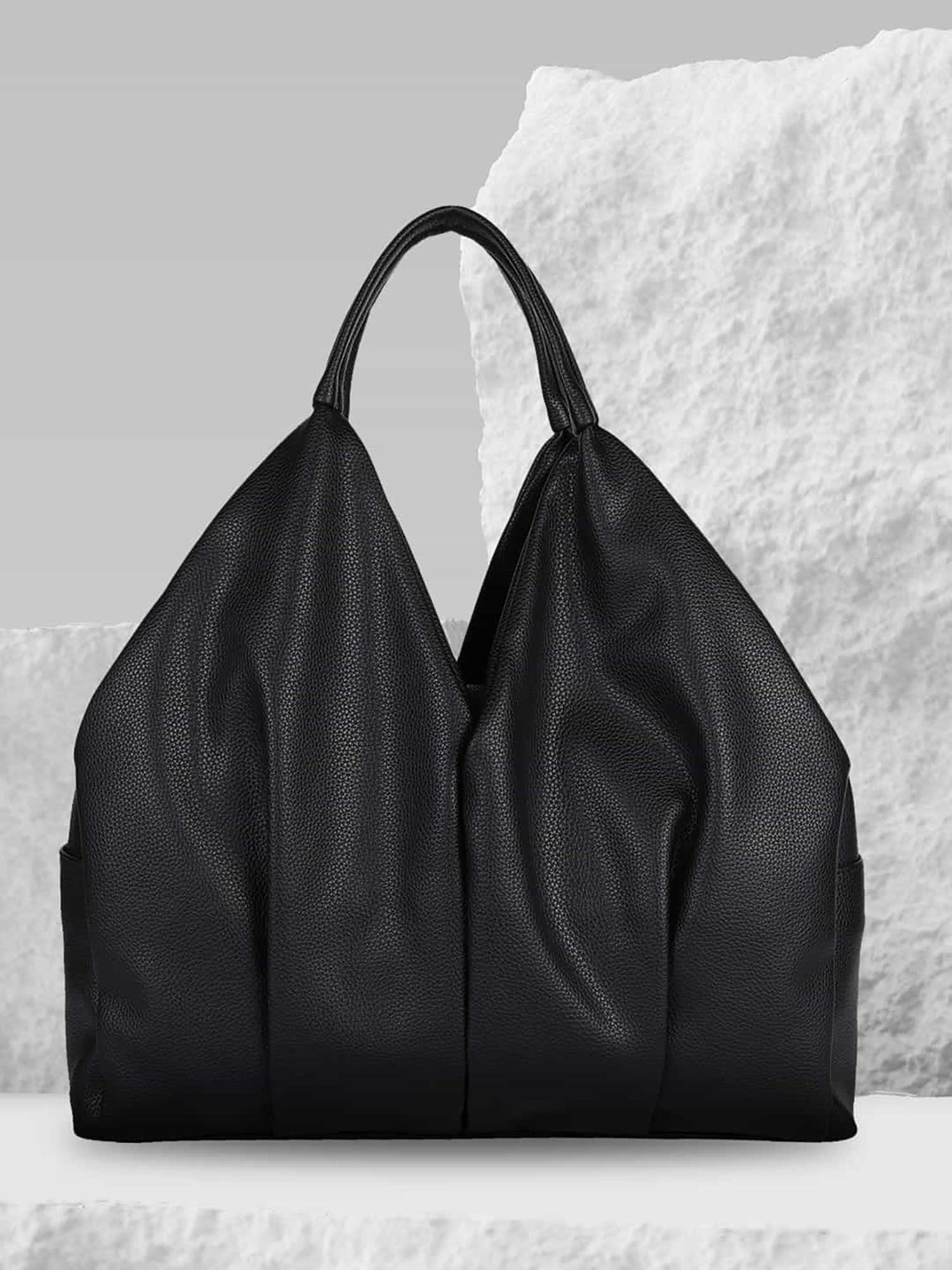 black solid handheld bag