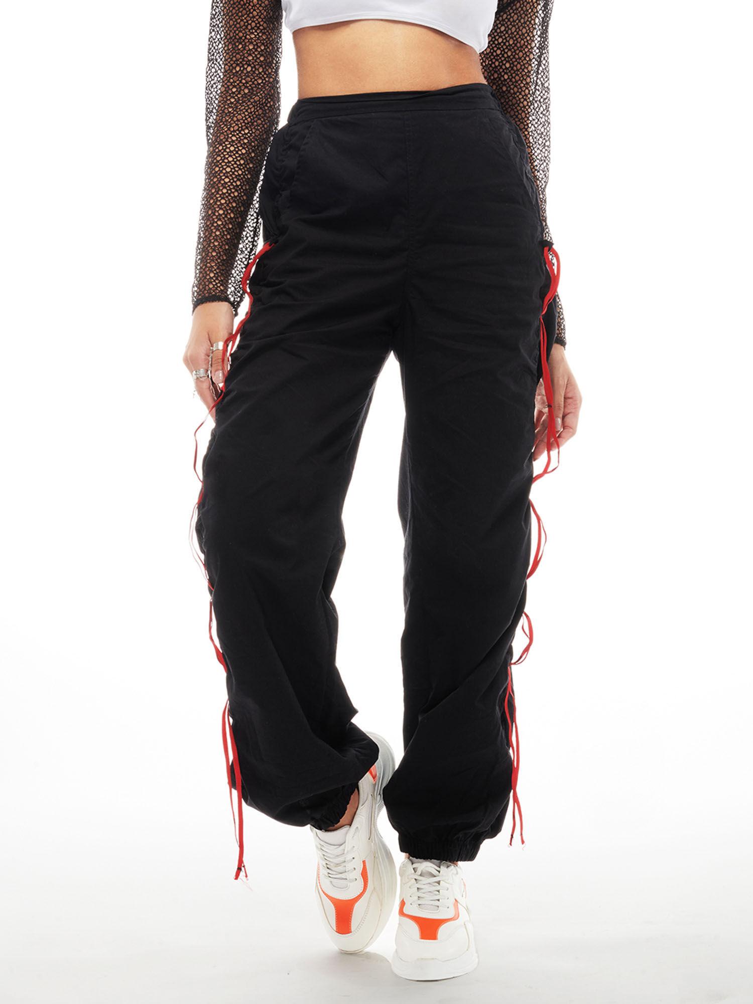 black tapered parachute pants