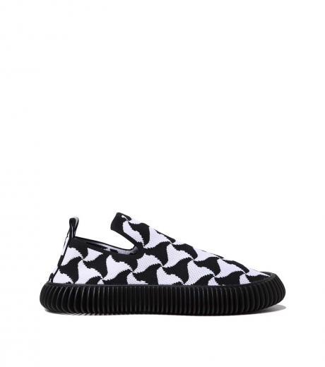 black white unlined slip on sneakers