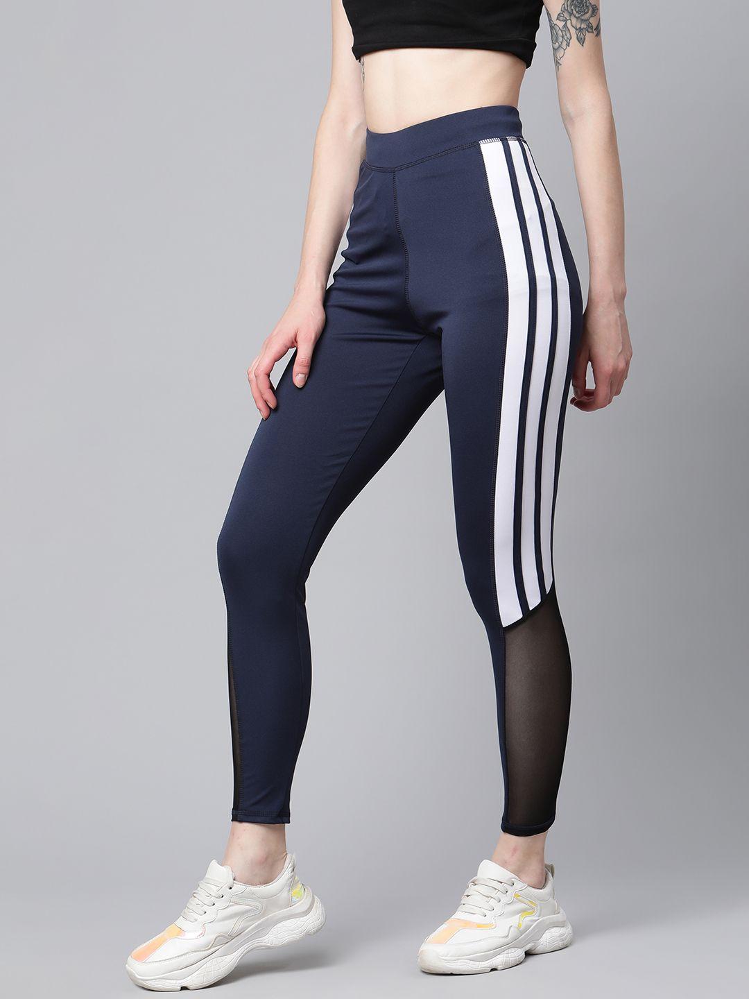 blinkin women navy blue & white solid training tights with mesh inserts detail