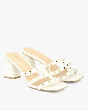 block heeled slip-on sandals with stud accent