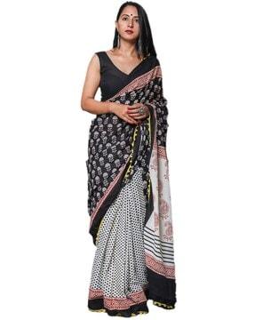 block print saree with pom-pom accent