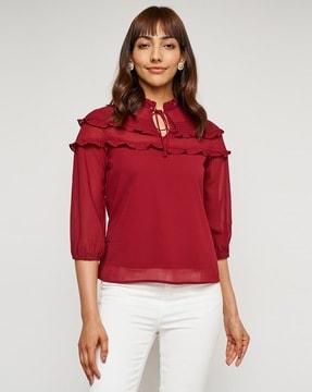 blouse with ruffled overlay
