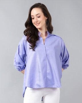 blouson top with high-low hemline