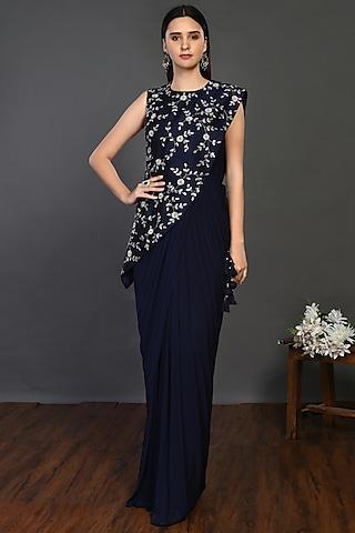 blue draped gown with embroidered blouse