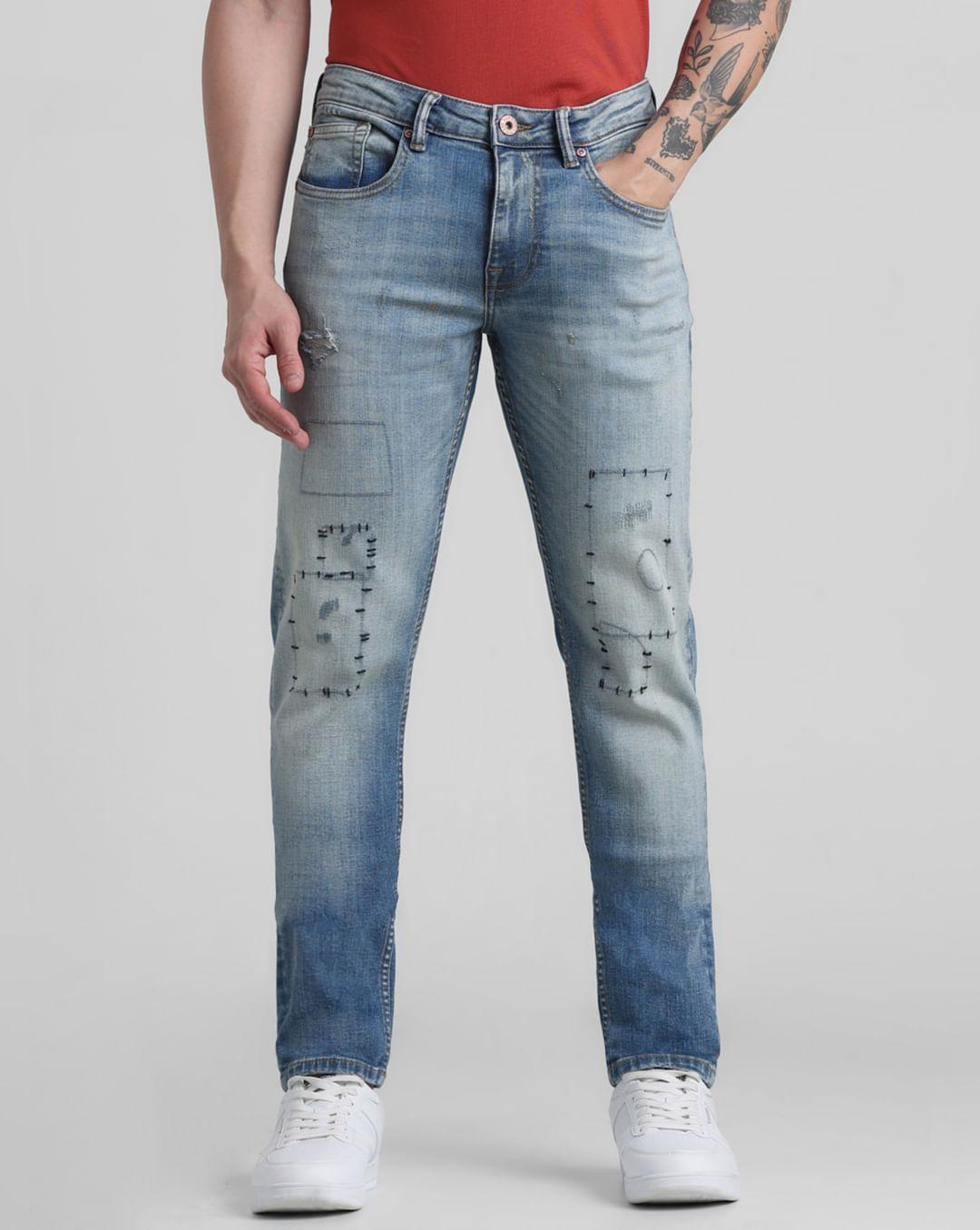 blue low rise stitch detail slim jeans