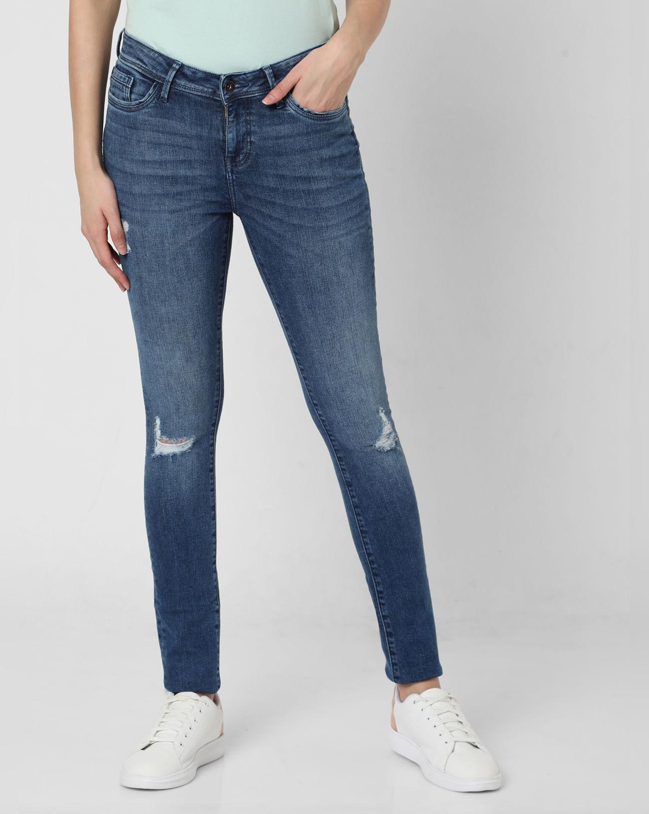 blue mid rise ripped skinny jeans