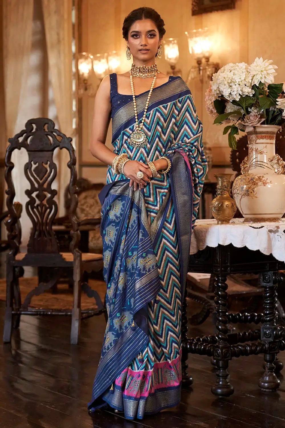 blue colour smooth patola silk saree with dimond work