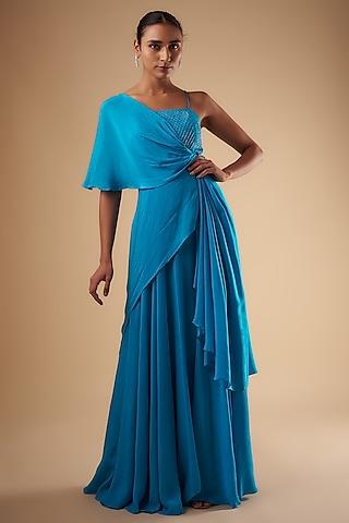 blue crepe draped gown