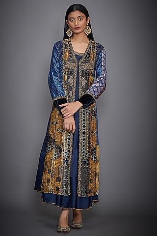 blue embroidered dress with ochre jacket