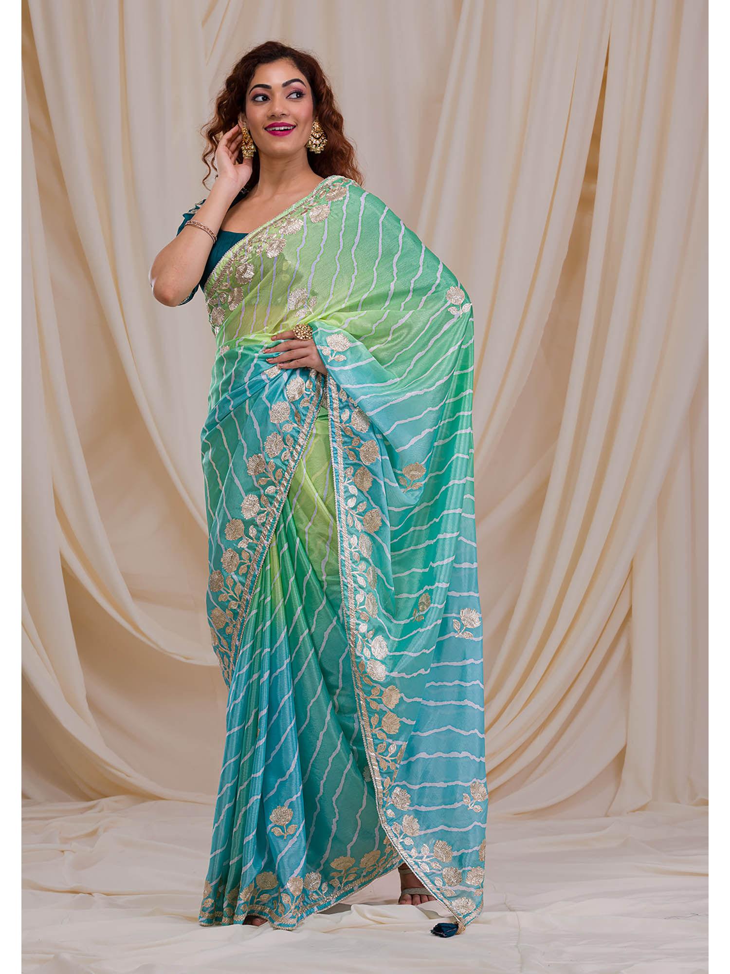 blue embroidered printed crepe saree with unstitched blouse