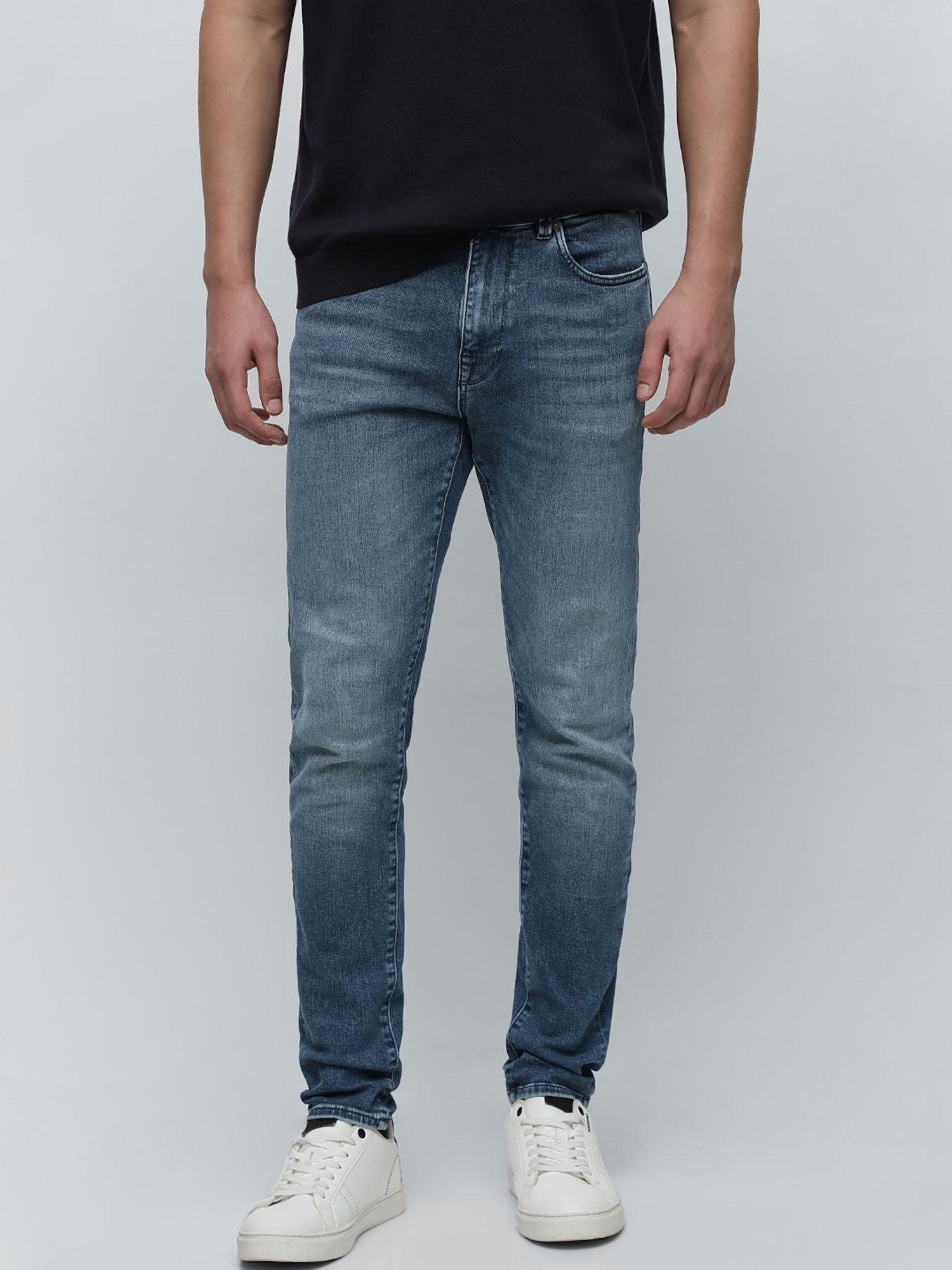 blue mid rise leon slim fit jeans