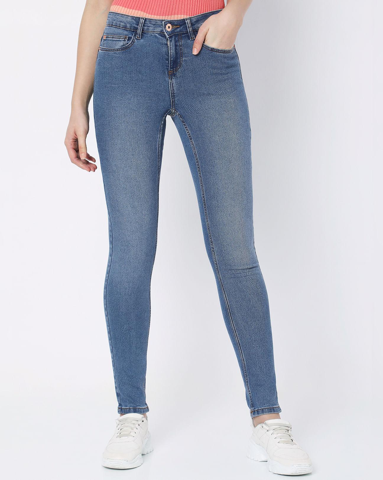 blue mid rise skinny jeans