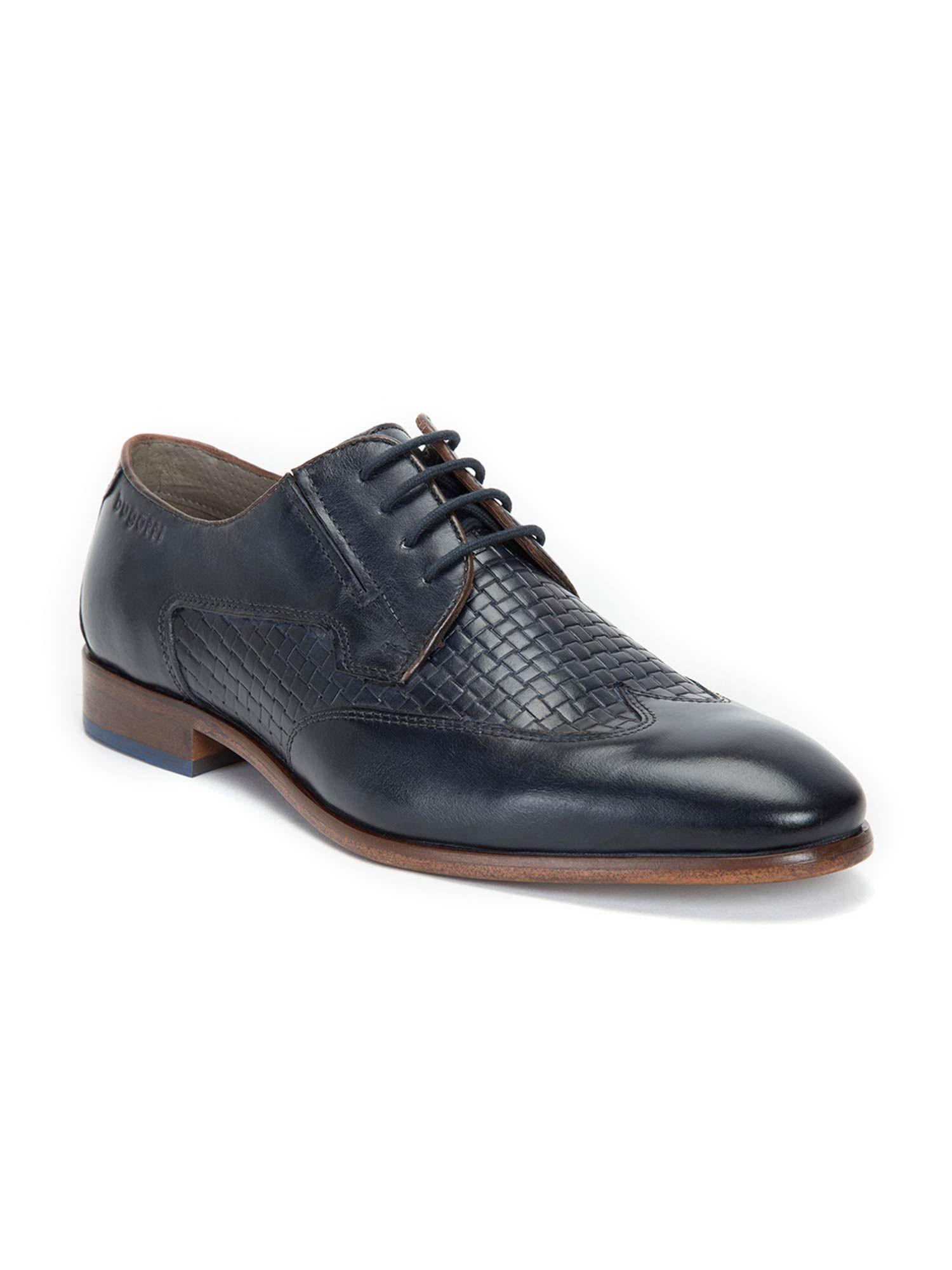 blue patterned brogues